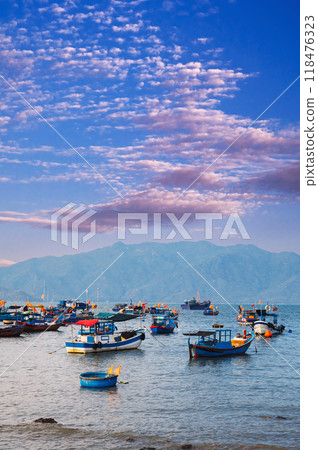 Vietnamese traditional fishing boats in sea at the marina in summer Vietnamese traditional fishing boats in sea at the marina in summer 118476323