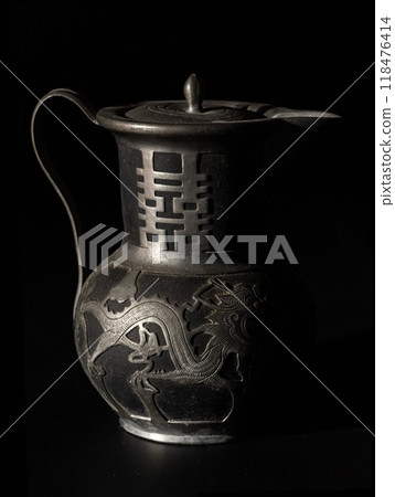 Chinese traditional teapot with dragon pattern and chinese characther double (Translation meaning is Double Happiness). Chinese traditional teapot with dragon pattern and chinese characther double (Translation meaning is Double Happiness). 118476414