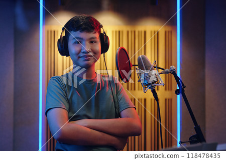 Portrait of Teen Recording in Professional Studio Portrait of Teen Recording in Professional Studio 118478435