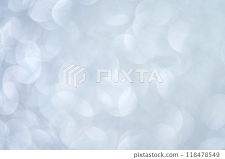 Bokeh circle with silver sparkles background. Grey glitter backdrop. Monochrome Bokeh circle with silver sparkles background. Grey glitter backdrop. Monochrome 118478549