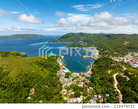 Port Romblon with ferry and boats. Coastal town city in Romblon Island, Romblon, Philippines. Port Romblon with ferry and boats. Coastal town city in Romblon Island, Romblon, Philippines. 118479735