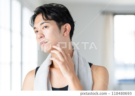 Young man shaving 118480693