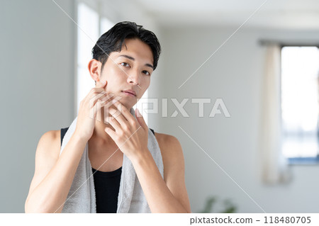 Young men doing skin care Young men doing skin care 118480705