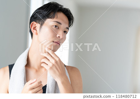 Young man suffering from skin problems Young man suffering from skin problems 118480712