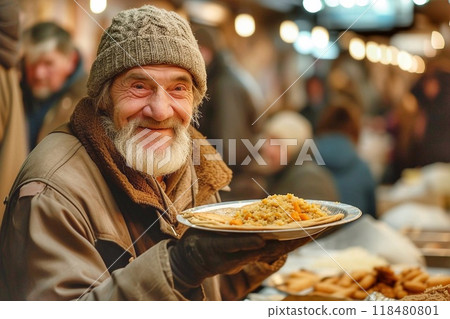 A homeless man eats in the canteen of the shelter 118480801