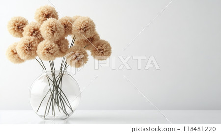Decorative dried flowers in a vase on a minimalist table setting indoors 118481220