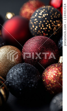 Sparkling red and black Christmas ornaments arranged on a festive dark background Sparkling red and black Christmas ornaments arranged on a festive dark background 118481414