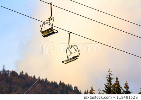 Ski lift with empty seats in ski resort Ski lift with empty seats in ski resort 118481529