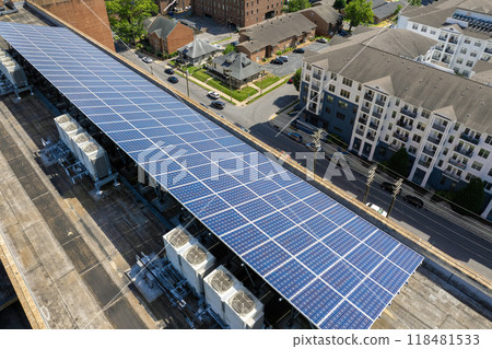 Solar rooftop on apartment condo building in Nashville, Tennessee. Production of clean ecological electrical energy. Renewable electricity with zero emission Solar rooftop on apartment condo building in Nashville, Tennessee. Production of clean ecological electrical energy. Renewable electricity with zero emission 118481533
