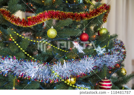 Decorated Christmas tree, sparkling and fairy background with copy space. New Year background with free text place. Christmas decorations concept Decorated Christmas tree, sparkling and fairy background with copy space. New Year background with free text place. Christmas decorations concept 118481787