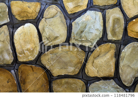 Different sizes of sand stones. Stone wall pattern background 118481796