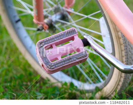 Closeup of a vintage style bicycle plastic pedal Closeup of a vintage style bicycle plastic pedal 118482011