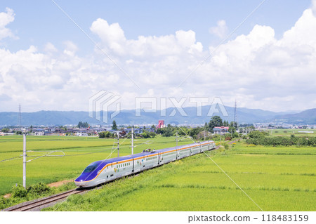 [Yamagata Line] Shinkansen Tsubasa train running through rural scenery 118483159