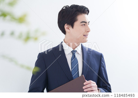 Working businessman (white background) Working businessman (white background) 118485493