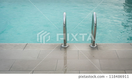 Swimming pool with handrail. Swimming pool with handrail. 118486911