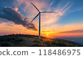 Graceful wind turbine silhouette spinning elegantly against a dramatic colorful sunset backdrop in a serene natural landscape Renewable energy and environmental conservation concept 118486975