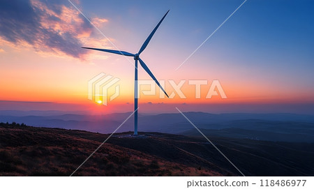Majestic wind turbine elegantly rotating against a breathtaking sunset sky harnessing the power of renewable energy in a serene and captivating natural setting 118486977