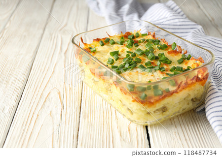 Concept of tasty and delicious homemade food - potato casserole Concept of tasty and delicious homemade food - potato casserole 118487734