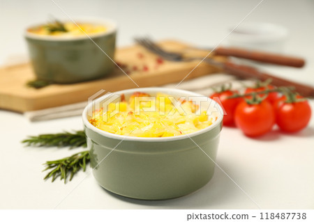 Concept of tasty and delicious homemade food - potato casserole Concept of tasty and delicious homemade food - potato casserole 118487738