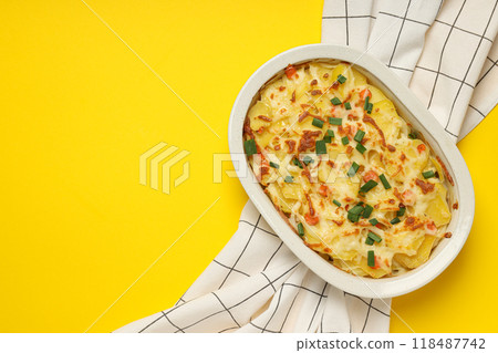 Concept of tasty and delicious homemade food - potato casserole Concept of tasty and delicious homemade food - potato casserole 118487742