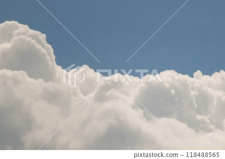 White Pearl of the Sky. Symbolizing peace and freedom, this photo depicts a lone white cloud rising in a vast, boundless sky. A perfect reflection of natural beauty and serenity. White Pearl of the Sky. Symbolizing peace and freedom, this photo depicts a lone white cloud rising in a vast, boundless sky. A perfect reflection of natural beauty and serenity. 118488565