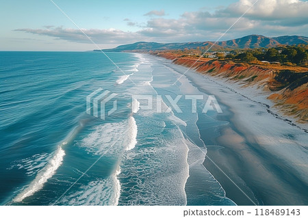Ocean is calm and the beach is sandy. Aerial view 118489143