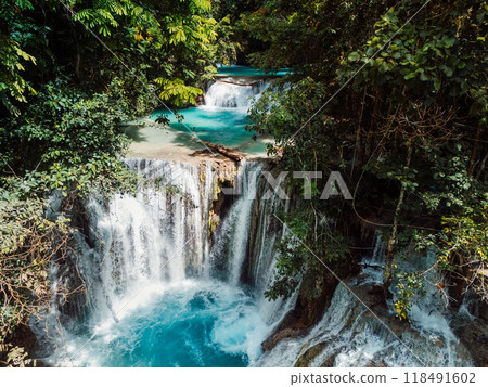 Scenic cascade waterfall with clear blue water in Central Sulawesi, drone view 118491602