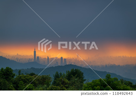 The city's skyscrapers are shrouded in golden mist. Dajianshan, Taiwan. 118492643