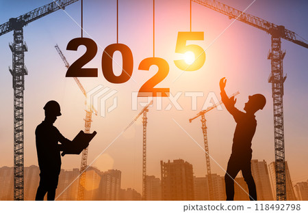 2025 year concept. Construction worker and crane on the backdrop of sunset and the numbers 2025 2025 year concept. Construction worker and crane on the backdrop of sunset and the numbers 2025 118492798