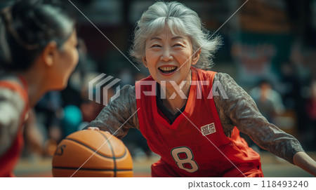 Grandmother playing basketball Grandmother playing basketball 118493240