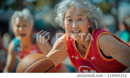 Grandmother playing basketball Grandmother playing basketball 118493252