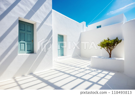 Dayllght greece courtyard with shadow on white wall. Beautiful Mediterranean style background 118493813