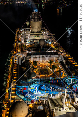 Cruise ship departing from Nagasaki Port (Adora Magic City) Night view of the Megami Bridge (illuminated) [Nagasaki City] 118494030
