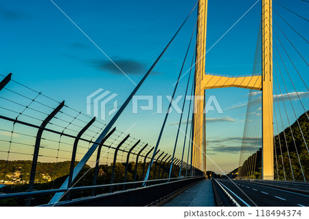Sunrise over Megami Ohashi Bridge [Nagasaki City] 118494374