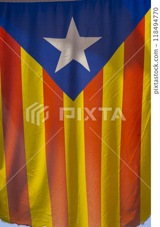 Catalan flag hanging between houses Catalan flag hanging between houses 118494770