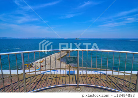 Looking westward at Cape Futtsu through the "100 Views of Mt. Fuji in Kanto" plaque from an observation deck in Futtsu City, Chiba Prefecture 118494888