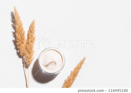Cosmetic beauty cream with natural dry grass Cosmetic beauty cream with natural dry grass 118495280