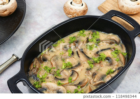Mushrooms in creamy sauce. Mushrooms in creamy sauce. 118498344