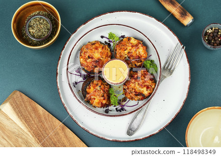 Stuffed baked mushroom caps. 118498349