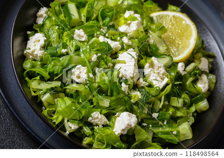 Classic Greek green lettuce salad with feta cheese Classic Greek green lettuce salad with feta cheese 118498564