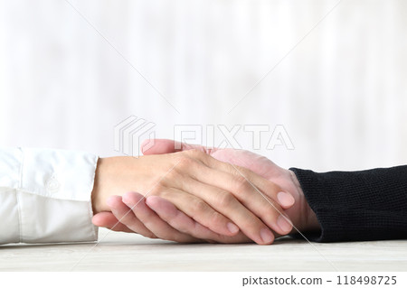 Hands of a friendly couple Hands of a friendly couple 118498725