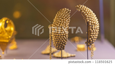 Ancient Gold Earrings or Karnabhushane - Symbol Of Lakshmi, Goddess Of Wealth. Ancient Splendor, Wealth And Elegance. Gold Represents Sky And Sun, It Is Naturally Luminous, And Is Symbol Of Life Ancient Gold Earrings or Karnabhushane - Symbol Of Lakshmi, Goddess Of Wealth. Ancient Splendor, Wealth And Elegance. Gold Represents Sky And Sun, It Is Naturally Luminous, And Is Symbol Of Life 118501625