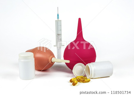 Medical syringes, medical syringe and pills on a light background 118501734