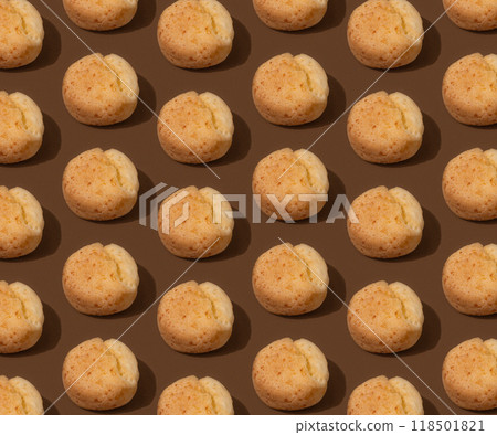 Food pattern with Brazilian cheese buns on the brown background 118501821