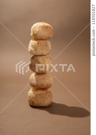 Brazilian cheese buns stacked on top of each other like a tower Brazilian cheese buns stacked on top of each other like a tower 118501827