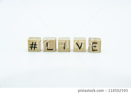 Word LIVE written on the wood cubes on white background. The concept photo with letters #live Word LIVE written on the wood cubes on white background. The concept photo with letters #live 118502593