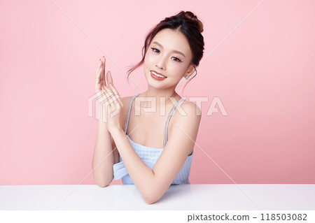 Beautiful young asian woman with clean fresh skin on pink background, Face care, Facial treatment, Cosmetology, beauty and spa, Asian women portrait. 118503082