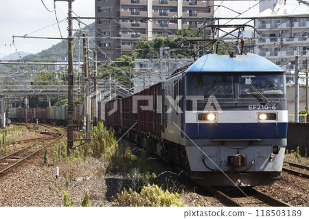 A freight train (pulled by EF210) passing through Hatano Station on the Sanyo Main Line A freight train (pulled by EF210) passing through Hatano Station on the Sanyo Main Line 118503189