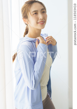 Portrait of a young woman who started an online yoga salon 118503410