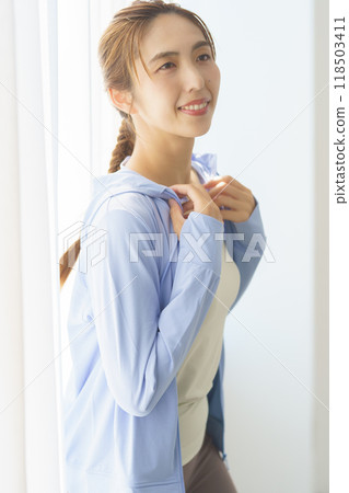 Portrait of a young woman who started an online yoga salon 118503411